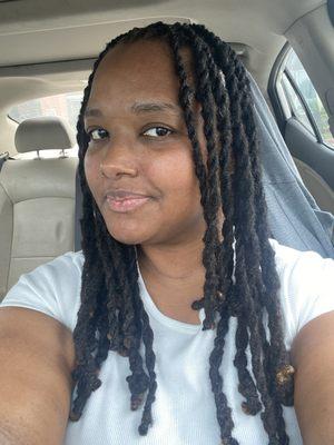 Wash, condition, and two strand twist on locs