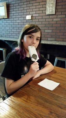 Haley enjoying the cookies and cream pop!