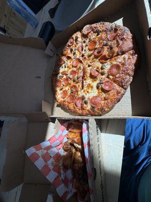 Large pepperoni and sausage pizza and 8 bbq wings