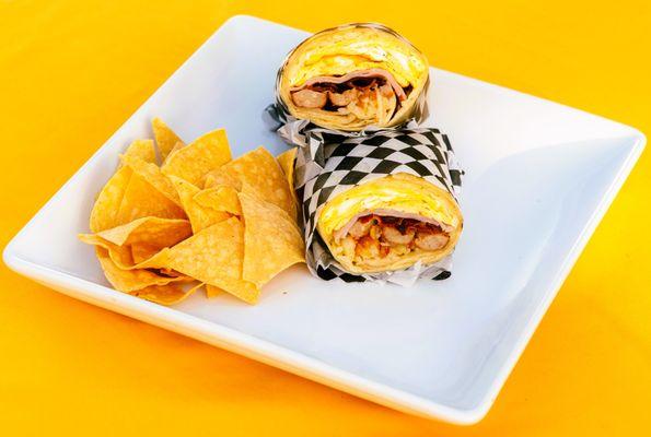 BREAKFAST BURRITOS; EGGS, HASHBROWNS, CHESSE, HAM, BACON, SAUSAGE, YOU GET A SIDE OF TORTILLA CHIPS, A RED AND GREEN SALSA