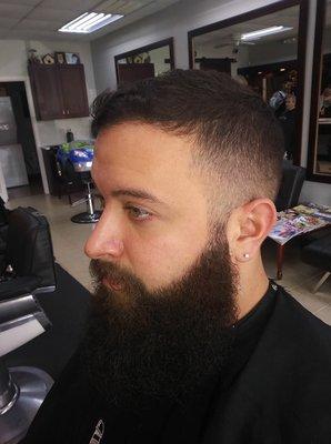 Fade and beard trim by Joshua