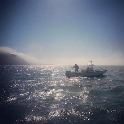 Adam fishing on his 25' boat.