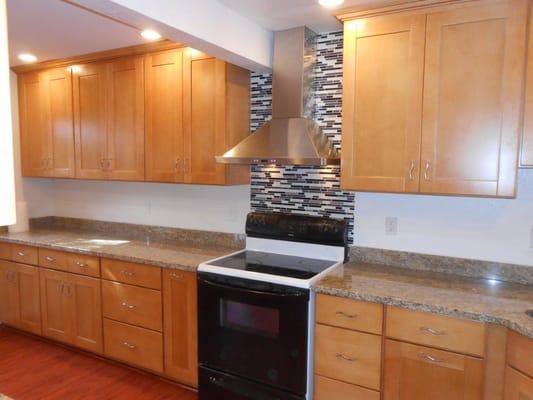 Brand new granite counter tops and beautiful cabinetry really pull the whole look together.