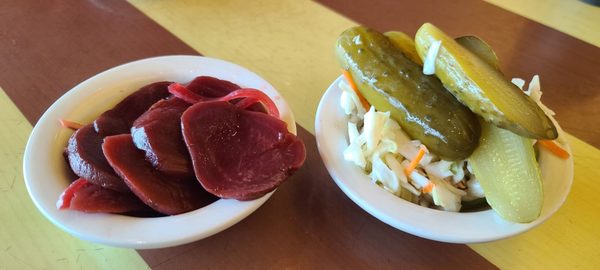 Complimentary pickled beets, pickles and cole slaw