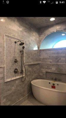 This was a unique install for one of our customers. Bath tub in the shower.