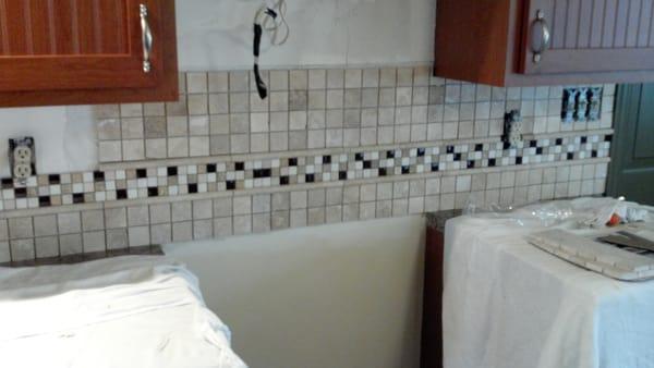 Another tiled backsplash