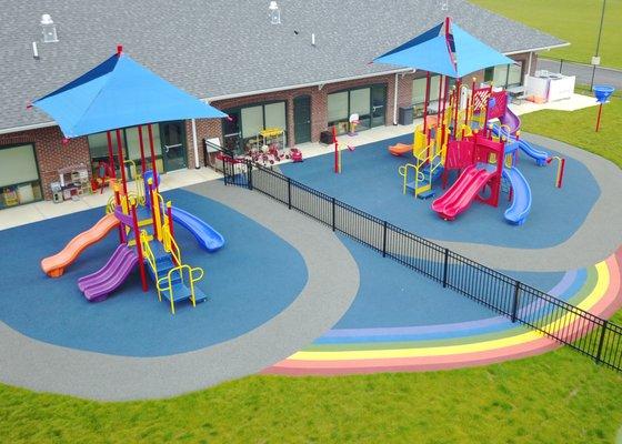 Custom Poured In Place Safety Surfacing and Playground Equipment at Leaf Spring Day Care