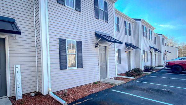 Photo graph of front door entrance of an apartment at Poplar Ridge Apartments