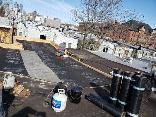 New roof installation with soffit buildout.