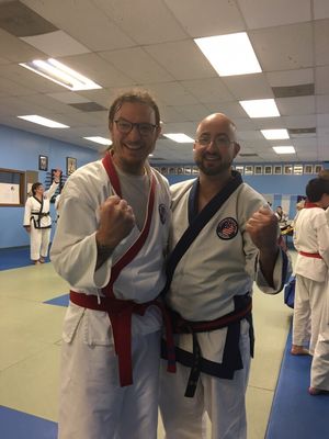 Adult student at the end of his black belt test!