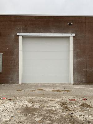 Dock Door Opening Cut By Hawley Coring Inc. In Arvada for high-performance race shop to install Colorado's First all-wheel Drive Dino.