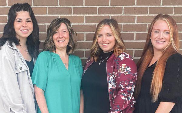 Meet our team (left to right): Kennedi, Salon Assistant, Jen, Owner and Stylist, Katie, Reflexologist and Receptionist, Tanya, Stylist