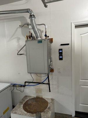 after 50 gallon water heater tankless installed.