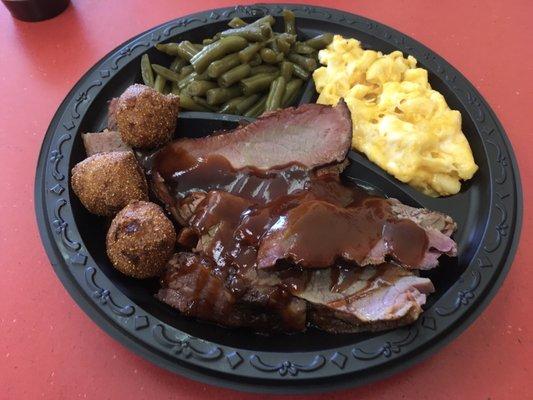 Brisket platter with 2 sides and hush puppies