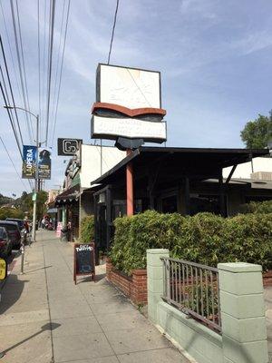 Three didn't take down the old sushi sign yet