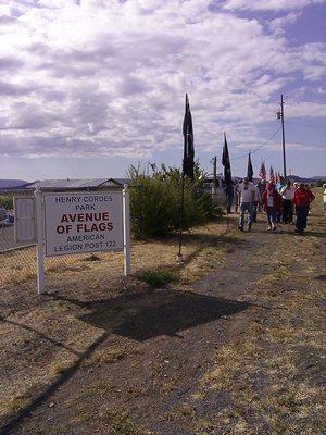 Memorial Day 2015 - Volunteers putting up the half mile long flags!