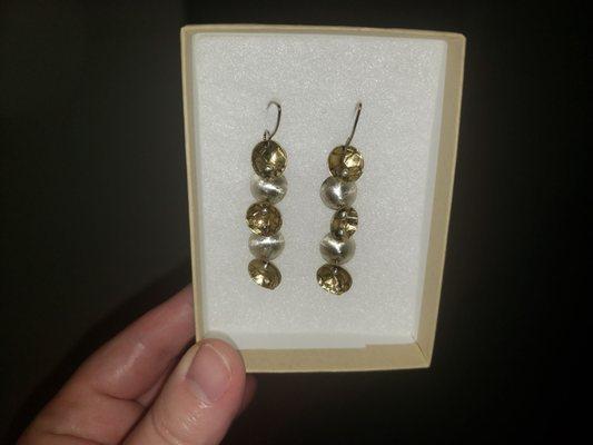 Handmade earrings feature brass and sterling silver. Gorgeous and surprisingly lightweight.