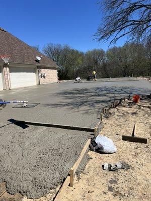 Concrete slab and new driveway pour