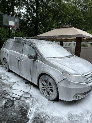 Honda odyssey during exterior foam wash.