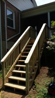 Built stairs to the back yard from carport