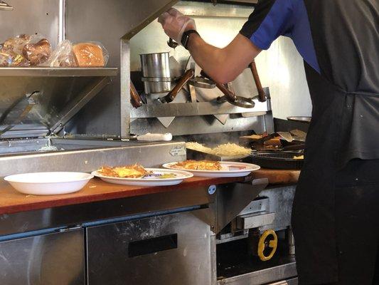 The cooks are very quick and efficient with preparing customers' meals.