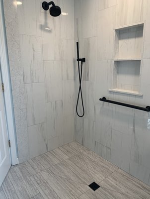 Curbless tile shower.