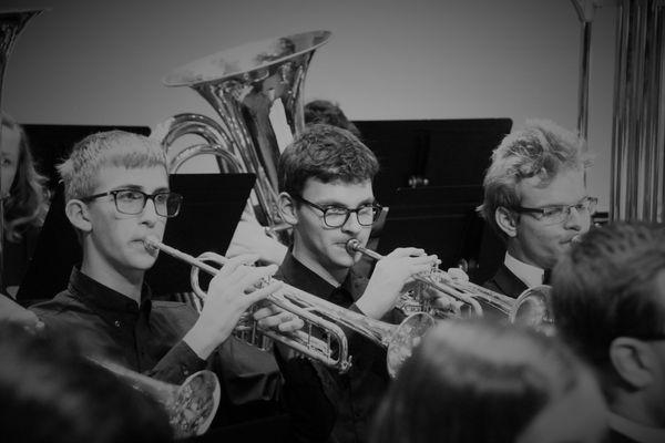 Students playing trumpets