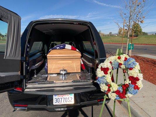 Freddie suggested we take a photo with the coffin and the wreath and set it up for me.