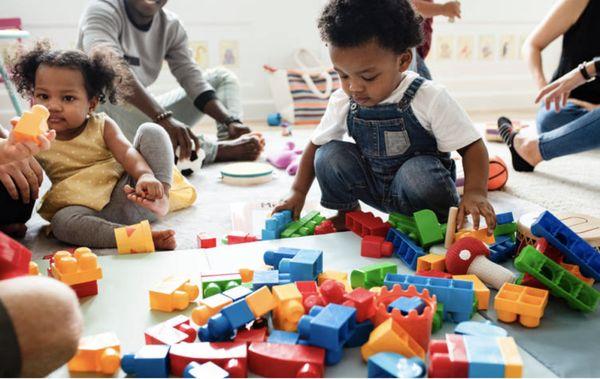 We love buidling with legos with our friends to build fine motor skills, social skills and cognitive development.