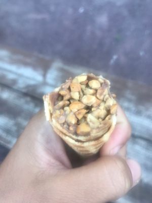 End of the cone filled with peanuts