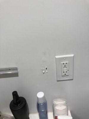 They nailed medicine cabinet in the gypwall!