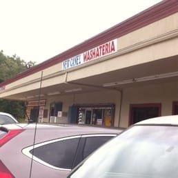 Frontside view of the convenience store and laundry place