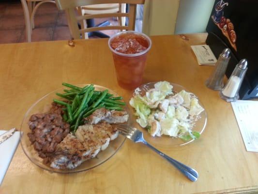 Pork chop, sauteed green beans and pinto beans...appetizer? Shrimp salad! And like a true Southern woman, sweet tea for my beverage...Yum!