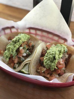 Lechon tacos (braised sour orange pork) with guac