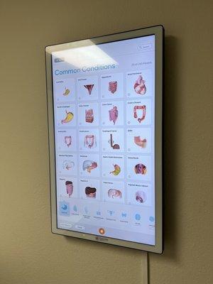 The interesting interactive medical board in the exam room.