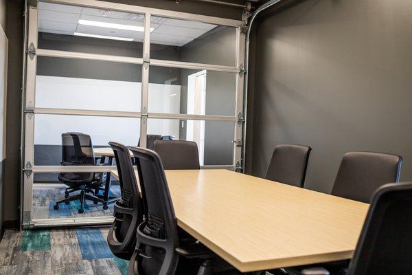 Large Conference Room looking into Small Conference Room.
Garage Style Door Opens to create Extended Conference Room