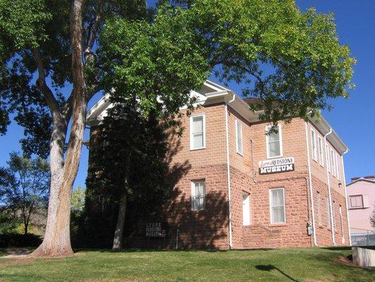 Museum is in a red sandstone schoolhouse built in 1881.