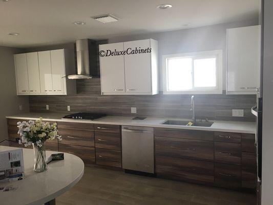 Modern kitchen done by Deluxe Cabinets.