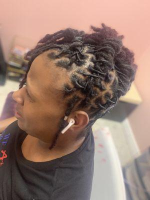 Loc retwist with updo style