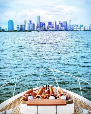 NauticGals and Miami skyline.