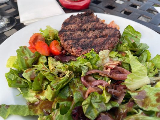 Burger on a salad.