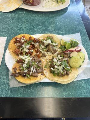 Tope left Al pastor top right tripa bottom left legua and bottom right asada .