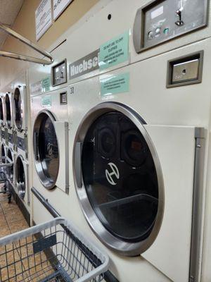 50lb. DRYERS - 25 cents for 6 minutes. Great for comforters & sleeping bags.