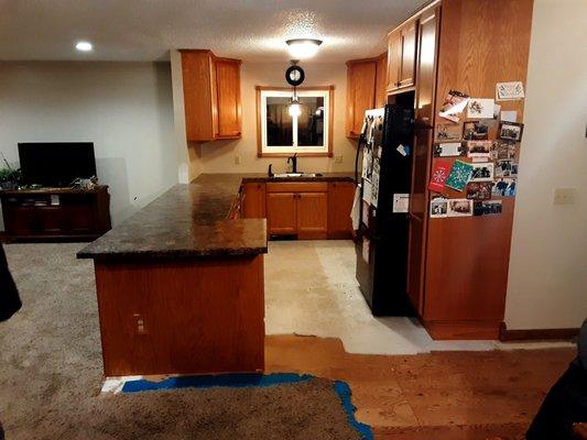 Mike and Jennifer's new kitchen. Looks like a new home with the walls and bulkheads removed.