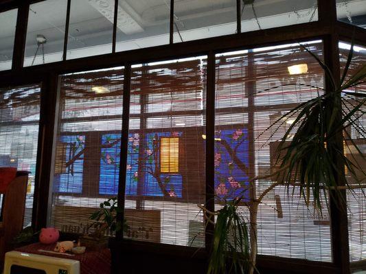 The screen and stained glass beckon you to enter and have patience w your Tai Chi.