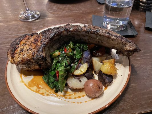 Berkshire Pork Chop with potatoes and Swiss Chard