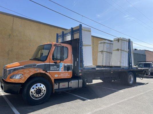 Whole truck of replacement doors for a home remodel.