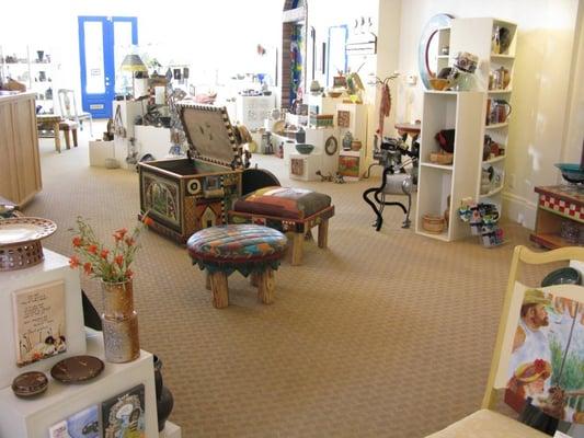 This is the interior of our craft gallery.  We feature lots of pottery, jewelry, blown glass, accessories and furniture.