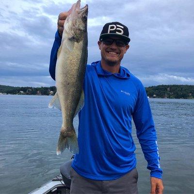 Salesman Eric Svensson spending time on Lake Hopatcong fishing from one of our Lund Boats