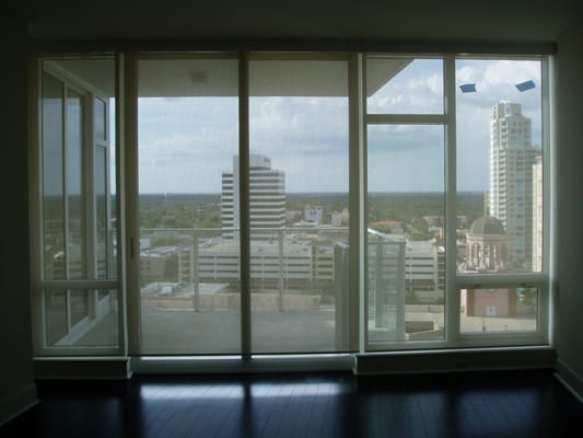 A beautful view of the city of St. Petersburg skyline through a sunscreen roler shade from Unique Wholesale.